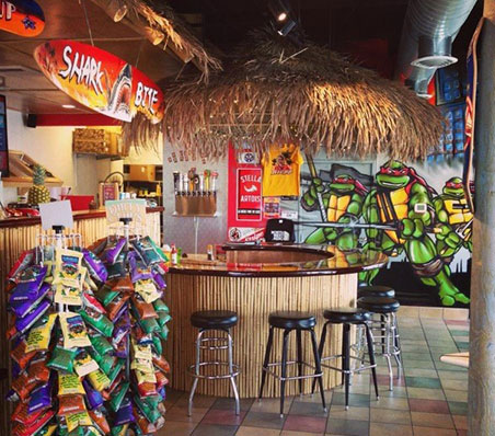 Beach Hut Deli interior photo - inviting atmosphere with a cool beach theme